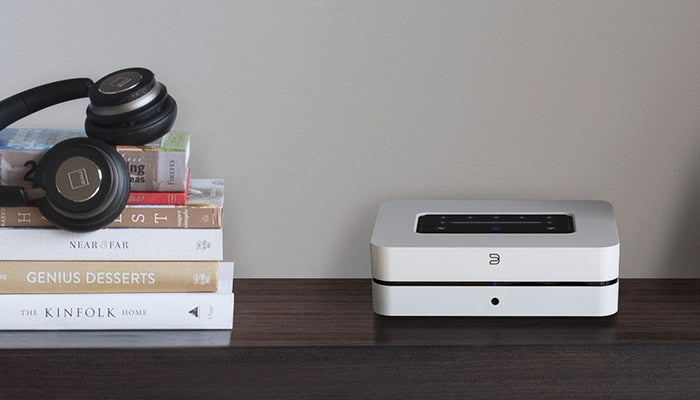 Bluesound Powernode white front top on cabinet view