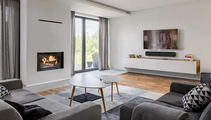 Bluesound PULSE SOUNDBAR+, lifestyle view at Toma Audio
