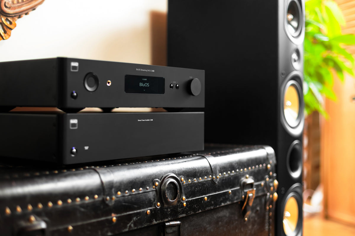 NAD hi-fi components and speakers in a warm listening room